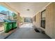 Covered side porch with brick columns and concrete flooring at 3388 Jackson Dr, Decatur, GA 30032