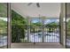 Balcony overlooking a private pool and lush green landscape at 490 Birkdale Dr, Fayetteville, GA 30215