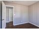 Well-lit bedroom with wood floors and an adjacent room at 1395 W Austin Rd, Decatur, GA 30032