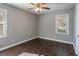 Bedroom with hardwood floors, ceiling fan and window at 1395 W Austin Rd, Decatur, GA 30032