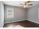 Bedroom with hardwood floors, ceiling fan, and window at 1395 W Austin Rd, Decatur, GA 30032