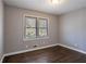 Bright bedroom featuring hardwood floors and large windows at 1395 W Austin Rd, Decatur, GA 30032