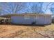 Gray brick ranch house with a large backyard at 1395 W Austin Rd, Decatur, GA 30032