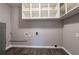 Laundry room with overhead shelving at 1395 W Austin Rd, Decatur, GA 30032