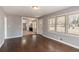 Living room with hardwood floors and kitchen view at 1395 W Austin Rd, Decatur, GA 30032
