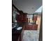 Double vanity bathroom with granite counters and dark wood cabinets at 190 Valley Cv, Atlanta, GA 30350