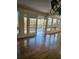 Bright dining room with hardwood floors and deck access at 190 Valley Cv, Atlanta, GA 30350