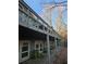 Elevated deck overlooking a wooded area, attached to the house at 190 Valley Cv, Atlanta, GA 30350