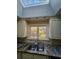 Kitchen boasts granite counters and double sink at 190 Valley Cv, Atlanta, GA 30350