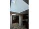Kitchen boasts skylights, granite counters, and dark wood cabinetry at 190 Valley Cv, Atlanta, GA 30350