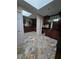 Bright laundry room with granite counters and ample cabinetry at 190 Valley Cv, Atlanta, GA 30350