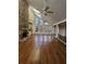 Living room with hardwood floors, stone fireplace and high ceilings at 190 Valley Cv, Atlanta, GA 30350