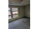 Empty spare bedroom with new gray carpet and windows at 190 Valley Cv, Atlanta, GA 30350