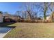 Grass backyard with a partial fence at 2446 Lynn Iris Dr, Decatur, GA 30032