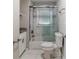 Modern bathroom with subway tile, a shower/tub combo, and granite vanity at 2446 Lynn Iris Dr, Decatur, GA 30032