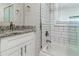 Updated bathroom with subway tile and granite vanity at 2446 Lynn Iris Dr, Decatur, GA 30032