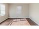 Spacious bedroom with dark hardwood floors and large windows at 2446 Lynn Iris Dr, Decatur, GA 30032