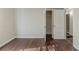 Bedroom with hardwood floors, neutral walls, and a closet at 2446 Lynn Iris Dr, Decatur, GA 30032