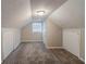 Attic bedroom with carpet, window, and built-in storage at 2446 Lynn Iris Dr, Decatur, GA 30032