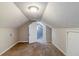 Attic bedroom with carpet and access to another room at 2446 Lynn Iris Dr, Decatur, GA 30032