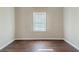 Empty bedroom with hardwood floors and neutral walls at 2446 Lynn Iris Dr, Decatur, GA 30032