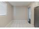 Bright dining area with tile floors and a view to the kitchen at 2446 Lynn Iris Dr, Decatur, GA 30032