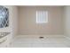 Simple dining area with tile floors and access to the kitchen at 2446 Lynn Iris Dr, Decatur, GA 30032