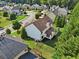 Aerial view of house and surrounding neighborhood at 334 Spotted Ridge Cir, Woodstock, GA 30188