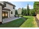 Grass backyard with patio and privacy fence at 334 Spotted Ridge Cir, Woodstock, GA 30188