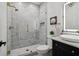 Spa-like bathroom with a large walk-in shower and marble tile at 334 Spotted Ridge Cir, Woodstock, GA 30188