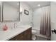 Modern bathroom featuring a subway tile shower, elegant vanity, and stylish finishes at 334 Spotted Ridge Cir, Woodstock, GA 30188