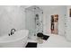 The bathroom features a freestanding tub, glass shower, and walk-in closet at 334 Spotted Ridge Cir, Woodstock, GA 30188