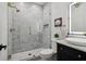 Sleek bathroom featuring a glass enclosed shower, vessel sink, and modern finishes at 334 Spotted Ridge Cir, Woodstock, GA 30188