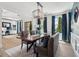 Bright dining room with a large table and bench seating at 334 Spotted Ridge Cir, Woodstock, GA 30188