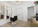 Sophisticated dressing room featuring a large mirror, vanity, and ample storage at 334 Spotted Ridge Cir, Woodstock, GA 30188
