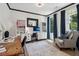 Spacious home office with built-in shelving and hardwood floors at 334 Spotted Ridge Cir, Woodstock, GA 30188
