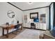 Bright home office featuring a large desk and comfortable seating at 334 Spotted Ridge Cir, Woodstock, GA 30188