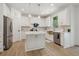 Stylish kitchen featuring white cabinetry, stainless appliances, and a central island at 334 Spotted Ridge Cir, Woodstock, GA 30188
