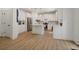 Modern kitchen with white cabinets, marble countertops, and stainless steel appliances at 334 Spotted Ridge Cir, Woodstock, GA 30188