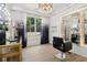 Elegant in-home salon with a stylish vanity and comfortable chair at 334 Spotted Ridge Cir, Woodstock, GA 30188
