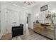 In-home salon with a large mirror and a gold vanity at 334 Spotted Ridge Cir, Woodstock, GA 30188