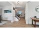 Elegant staircase with wrought iron railing and view to dining room at 334 Spotted Ridge Cir, Woodstock, GA 30188