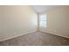 Bedroom with window and carpet at 7618 Mcgillicuty Dr, Union City, GA 30291