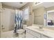 Clean bathroom with a shower/tub combo and white vanity at 2983 Rosebrook Dr, Decatur, GA 30033