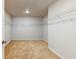 Large walk-in closet with wire shelving and neutral carpet at 123 Felicity Pike, Locust Grove, GA 30248