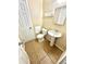 A cozy bathroom with a pedestal sink and tile floors at 869 Meadow Rock Way, Stone Mountain, GA 30083