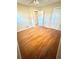 Bright bedroom with hardwood floors, ample closet space, and natural light at 869 Meadow Rock Way, Stone Mountain, GA 30083