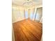 A bedroom with hardwood floors and ample closet space at 869 Meadow Rock Way, Stone Mountain, GA 30083