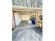 Covered carport with brick columns, providing convenient parking and protection from the elements at 869 Meadow Rock Way, Stone Mountain, GA 30083