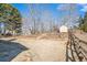 Large backyard with storage shed and raised garden beds at 232 Baywood Ln, Villa Rica, GA 30180